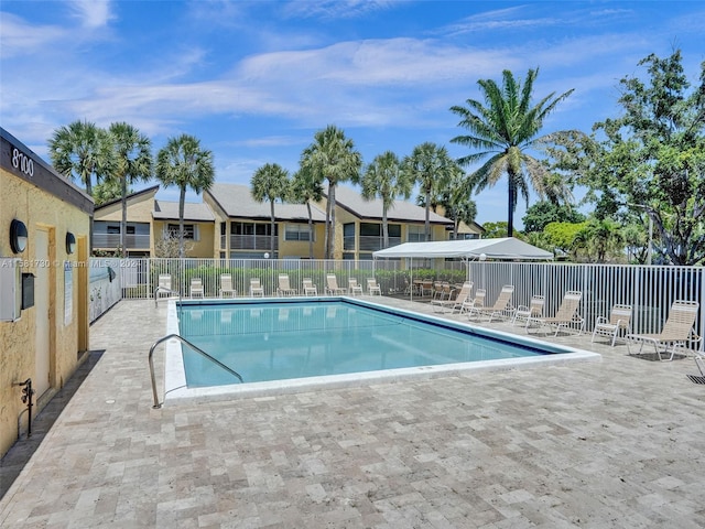 view of swimming pool featuring a patio