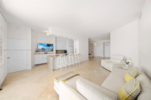 living room with light tile flooring