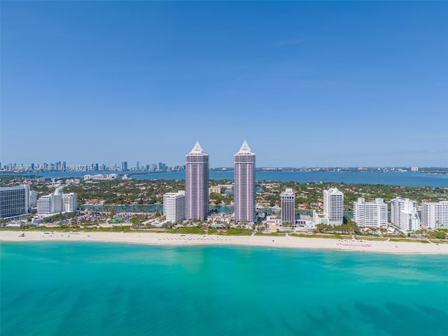 aerial view featuring a beach view and a water view