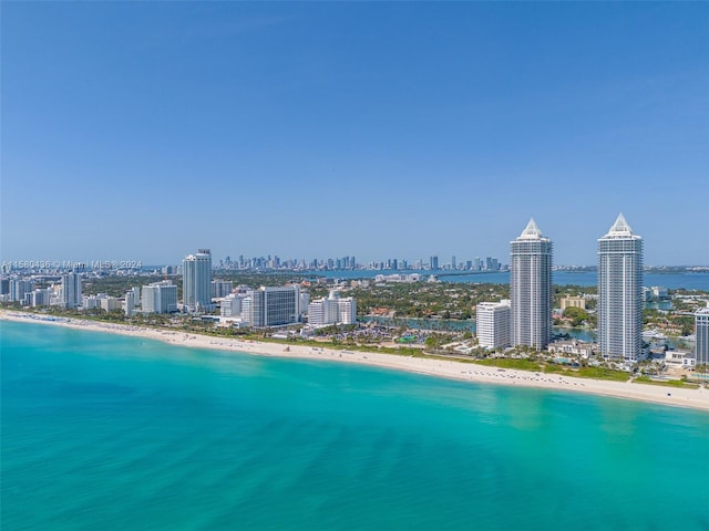 exterior space with a beach view and a water view