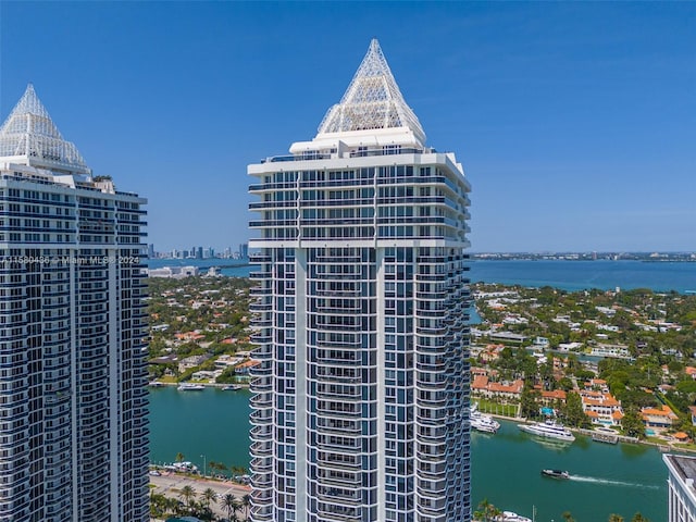 view of building exterior featuring a water view