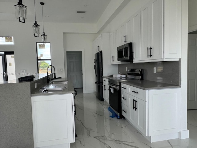 kitchen with range with electric cooktop, white cabinets, sink, light tile flooring, and pendant lighting