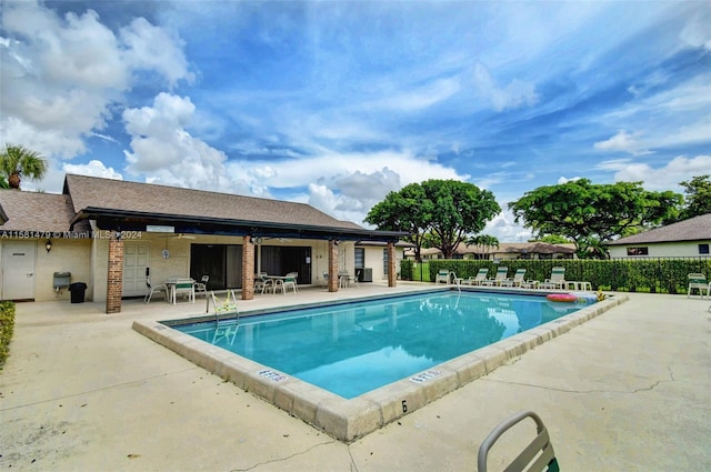 view of swimming pool featuring a patio