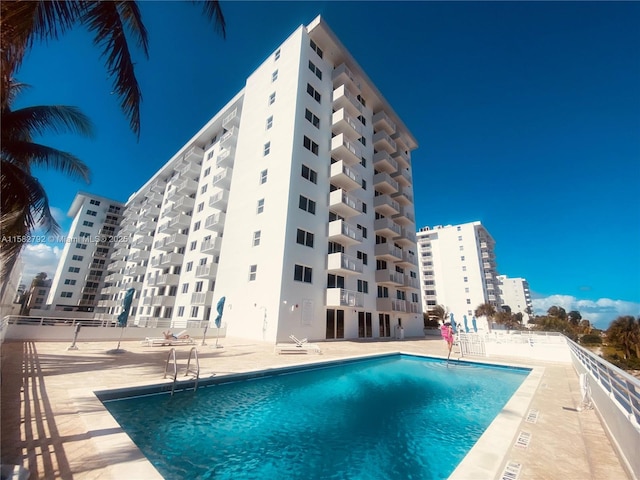 community pool with a patio