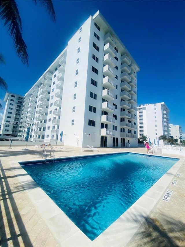 community pool featuring a patio