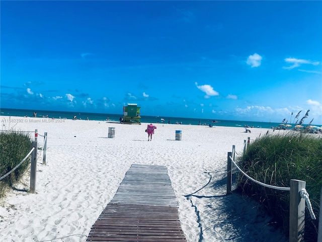 property view of water with a beach view