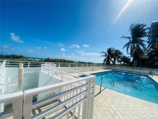 view of pool with a patio