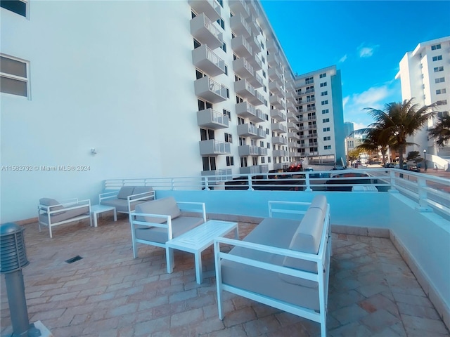 view of patio / terrace featuring a balcony