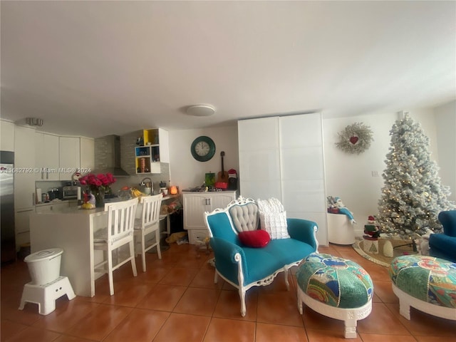 living room featuring dark tile patterned flooring