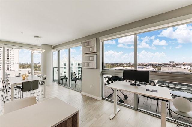 office with light hardwood / wood-style flooring