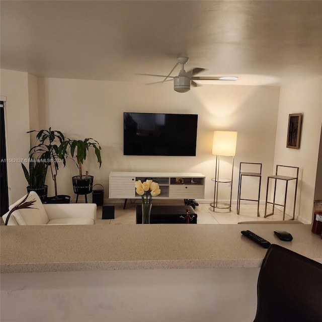 living room featuring ceiling fan