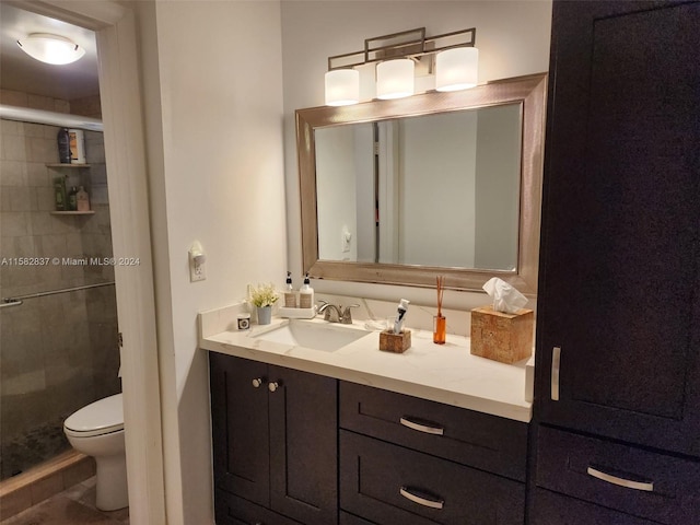 bathroom featuring walk in shower, toilet, and vanity