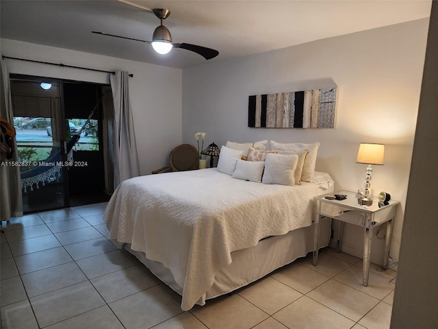 bedroom with ceiling fan, light tile flooring, and access to exterior