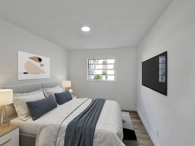 bedroom featuring hardwood / wood-style flooring