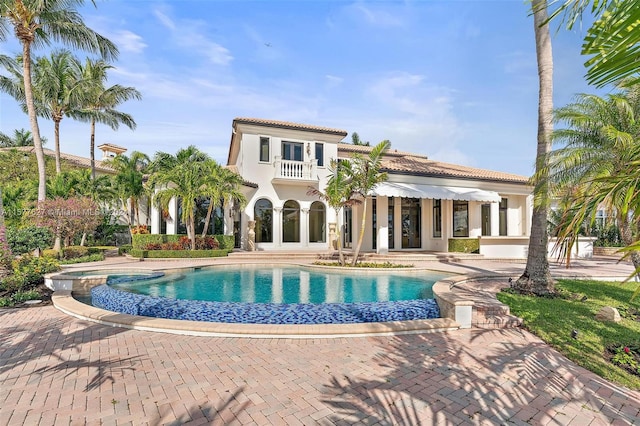 view of pool featuring a patio