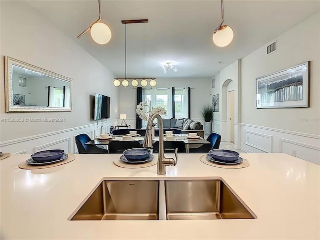 kitchen with hanging light fixtures and sink