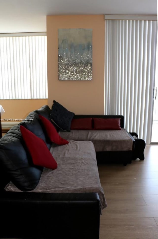 bedroom with wood-type flooring