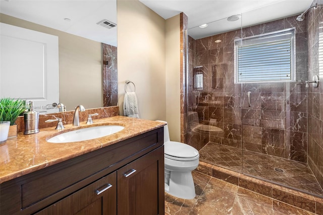 full bath with toilet, a stall shower, visible vents, and vanity