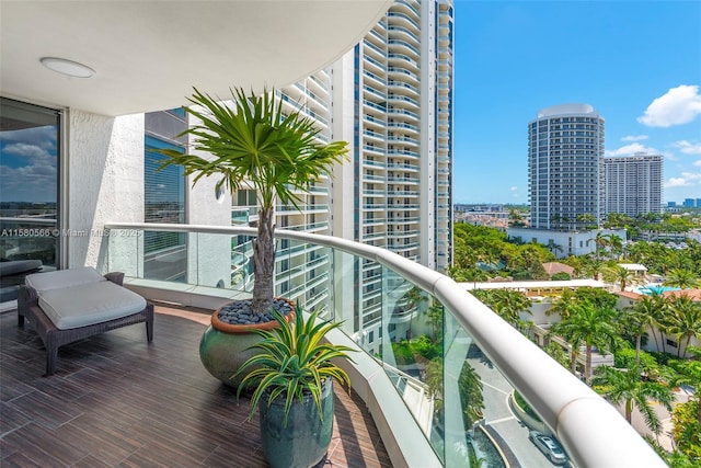 balcony featuring a city view