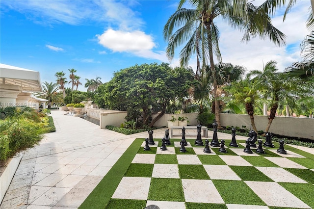 view of patio / terrace featuring fence