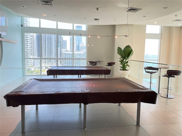 misc room featuring tile floors and billiards