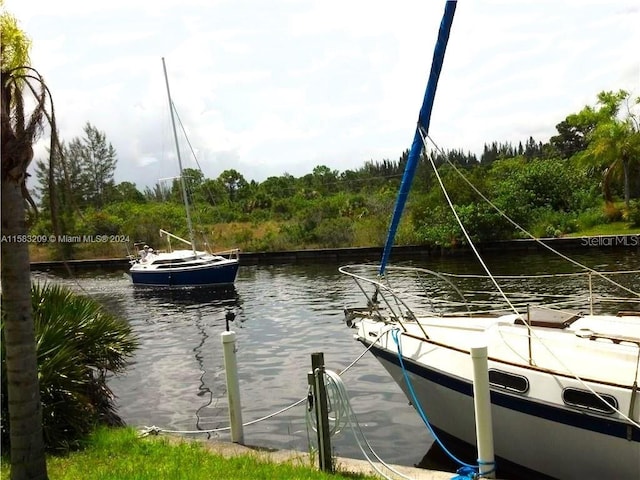 view of dock with a water view