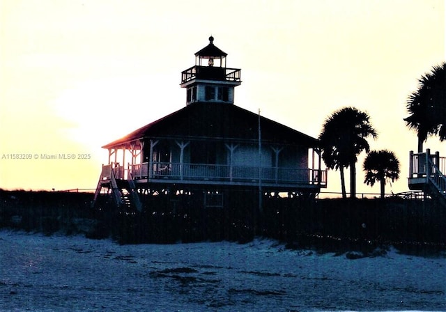 view of outdoor building at dusk