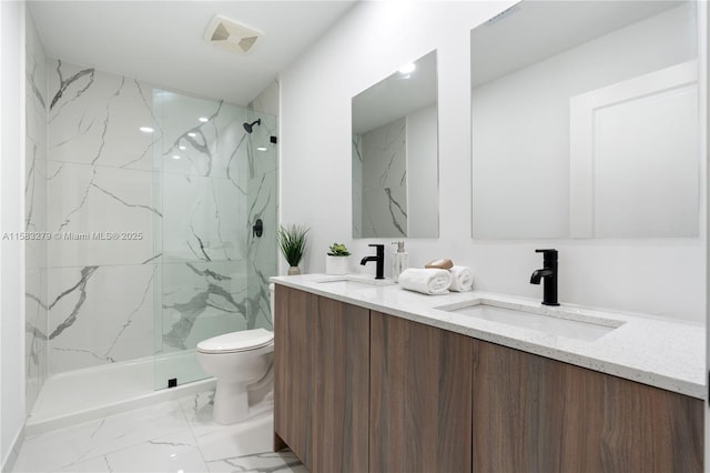 full bathroom featuring a sink, visible vents, toilet, and marble finish floor