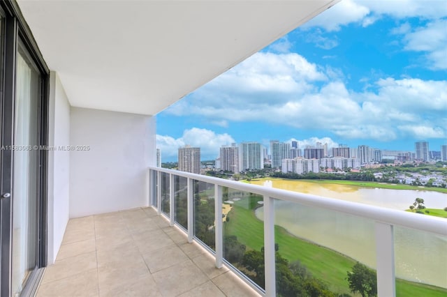 balcony featuring a water view