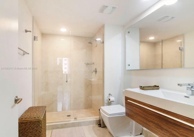 18800 NE 29th Ave Unit 520, Aventura, FL 33180 - full bathroom featuring toilet, a stall shower, vanity, and recessed lighting