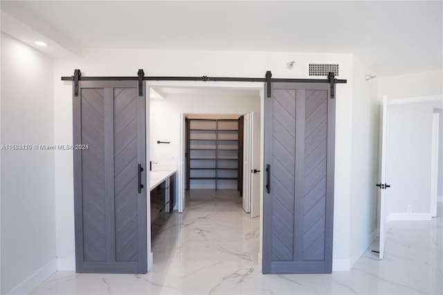 interior space featuring vanity and tile floors