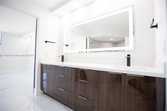 bathroom featuring tile flooring and large vanity