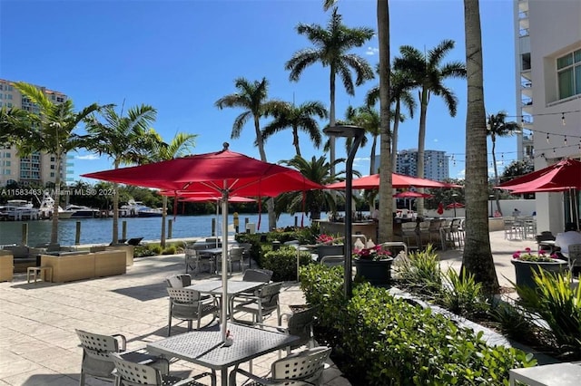 view of patio with a water view