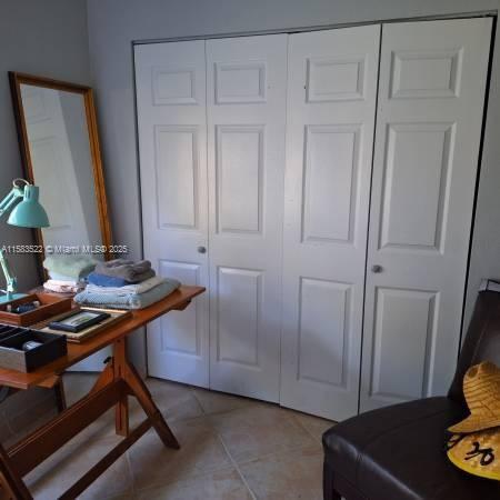 interior space with light tile patterned floors