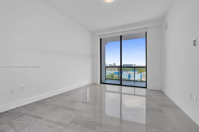 view of tiled spare room