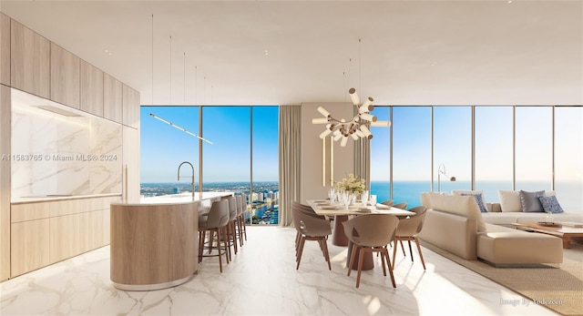 living room featuring floor to ceiling windows, ceiling fan, and a water view