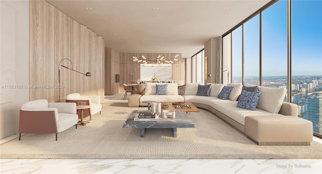 living room featuring floor to ceiling windows and an inviting chandelier