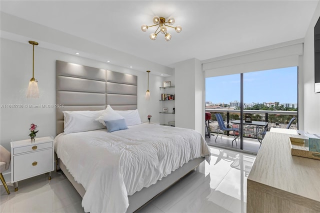 bedroom with a notable chandelier and access to outside