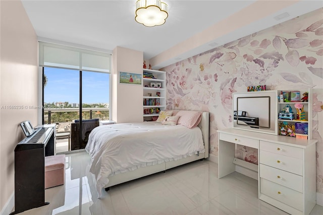 bedroom with floor to ceiling windows and light tile floors