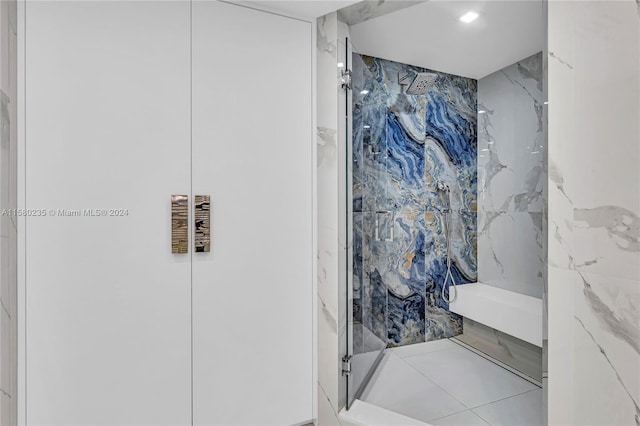 bathroom featuring tiled shower