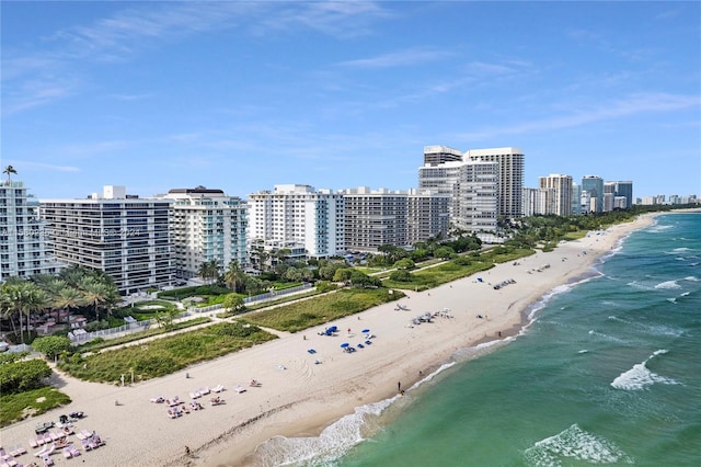 aerial view with a beach view and a water view