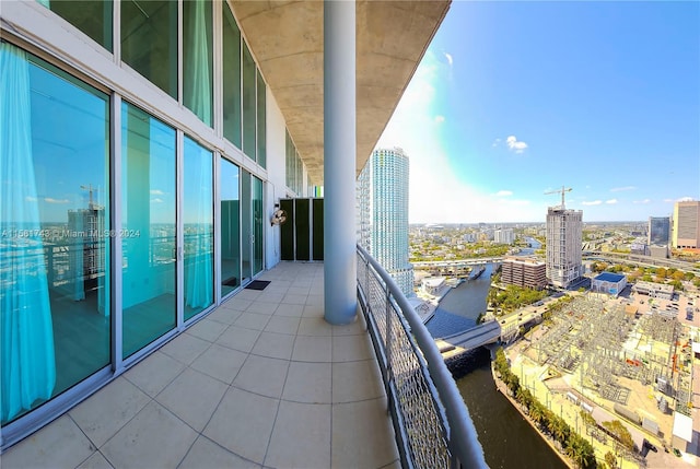 balcony featuring a water view