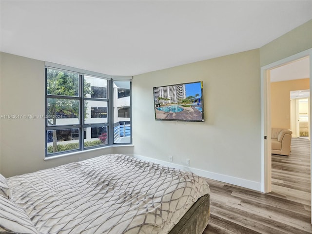 bedroom featuring hardwood / wood-style floors