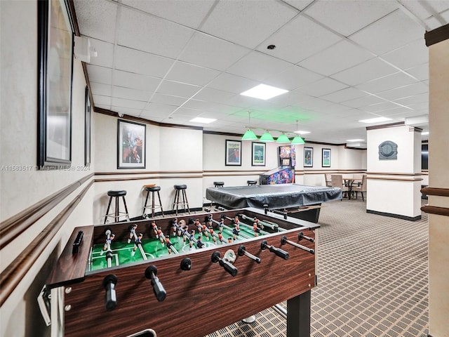 recreation room featuring a drop ceiling, carpet floors, and pool table