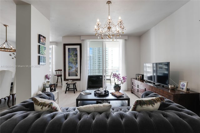 living area with an inviting chandelier