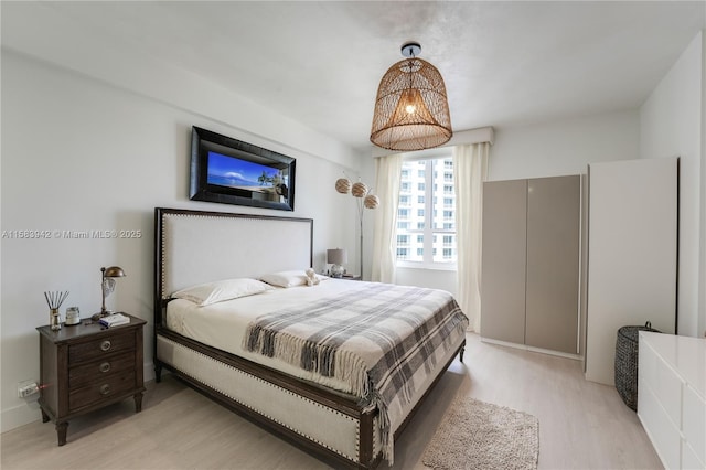 701 Brickell Key Blvd Unit Lph-06, Miami, FL 33131 - bedroom featuring light wood-type flooring