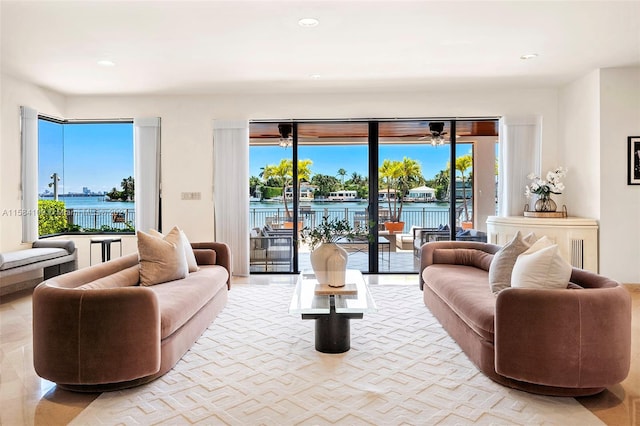 living room featuring a water view