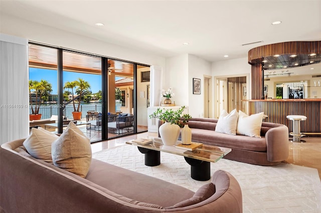 living room with light hardwood / wood-style flooring