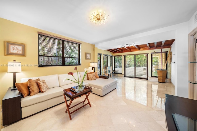 living room with beamed ceiling