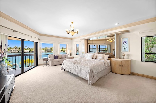 carpeted bedroom featuring ornamental molding, access to outside, multiple windows, and a notable chandelier